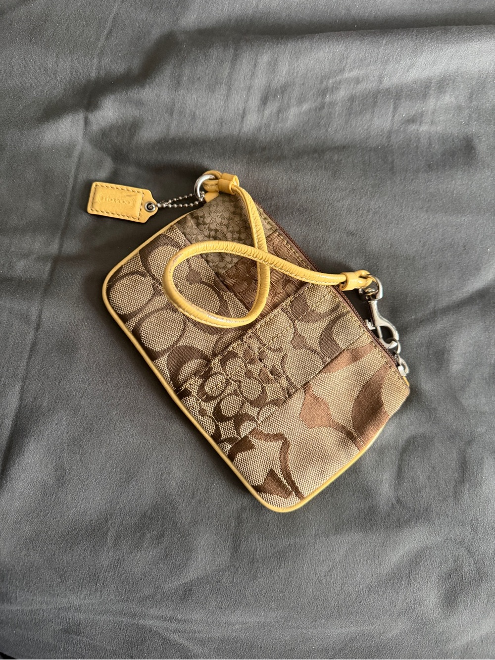 Coach Brown Signature Patchwork Wristlet with Yellow Trim